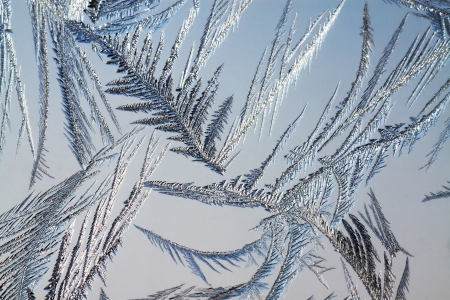 abstract background from frosty pattern on glassの写真素材