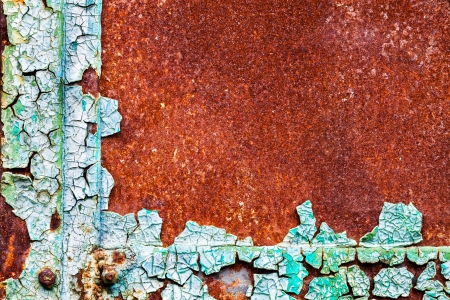 old abstract background from the cracked paint on rusty ironの写真素材