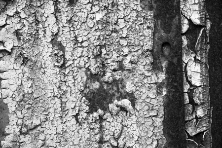 old abstract background from the cracked paint on rusty ironの写真素材