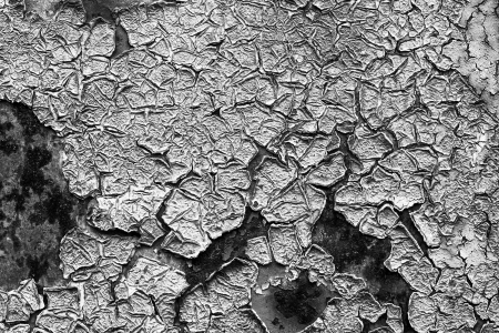 old abstract background from the cracked paint on rusty ironの写真素材