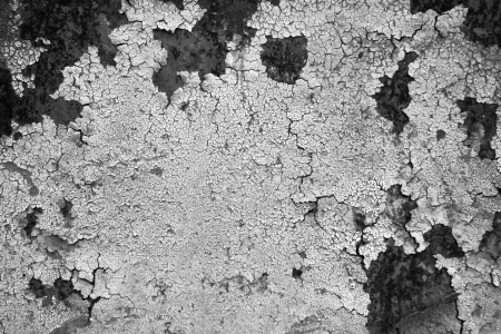old abstract background from the cracked paint on rusty ironの写真素材