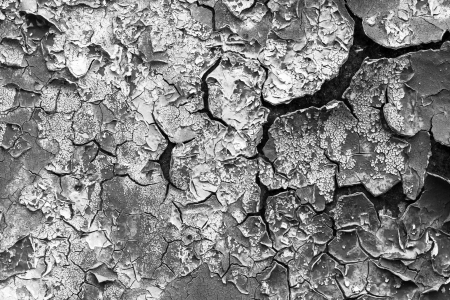 old abstract background from the cracked paint on rusty ironの写真素材