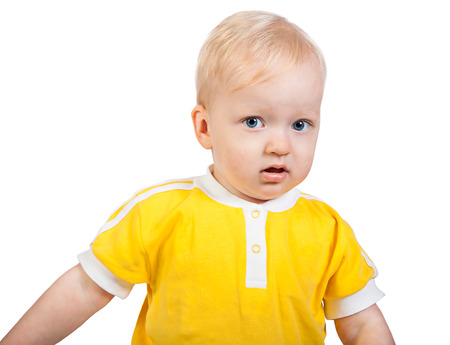 the beautiful small child sad isolated on a white backgroundの写真素材