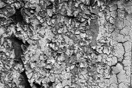 old abstract background from the cracked paint on rusty ironの写真素材