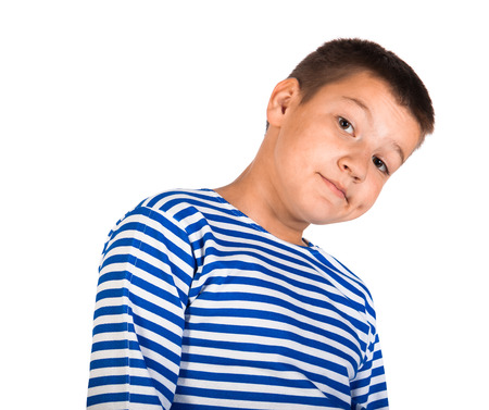 the beautiful thoughtful boy the teenager isolated on a white backgroundの写真素材