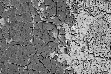 old abstract background from the cracked paint on rusty ironの写真素材