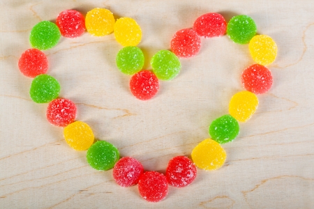 frame  a background from colorful sweets of sugar candiesの写真素材