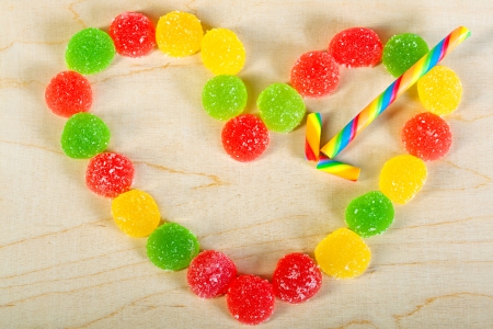 frame  a background from colorful sweets of sugar candiesの写真素材