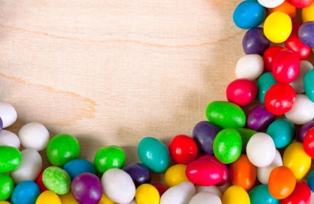 frame  a background from colorful sweets of sugar candiesの写真素材