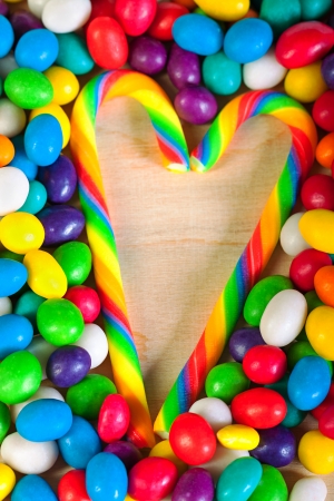 frame  a background from colorful sweets of sugar candiesの写真素材