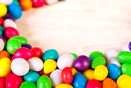 frame  a background from colorful sweets of sugar candiesの写真素材