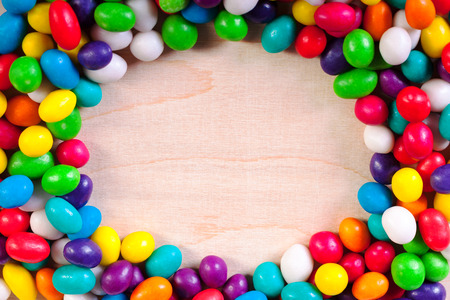 frame  a background from colorful sweets of sugar candiesの写真素材