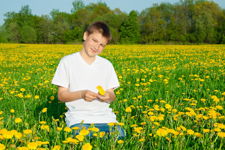 the boy the teenager on vacation outdoorの写真素材