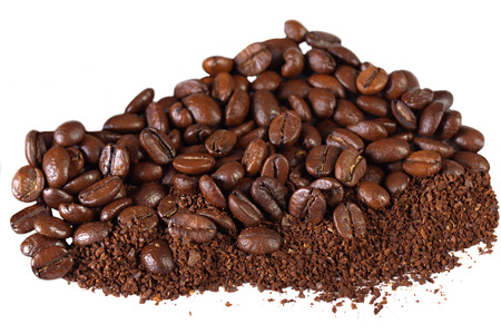 coffee grains isolated on a white の写真素材