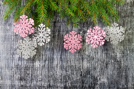 new year background from branches of a fir and snowflakesの写真素材