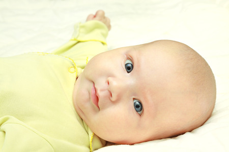 the little baby looking attentivelyの写真素材