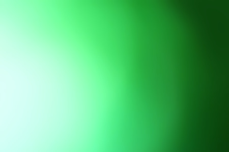 abstract green background. shine background with soft focus and a blur. green decorative empty design element, wallpaperの写真素材