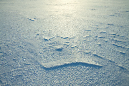 winter background from snow shiny in the sunの写真素材