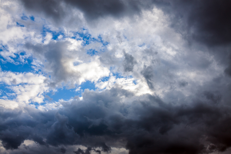 abstract background from dark storm clouds in sky. thunderstorm cloudscape, rain weather. moody sky.  の写真素材