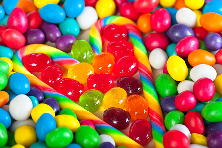frame from heart from colorful sweets of sugar candies. background from on candies. colored sweets close upの写真素材