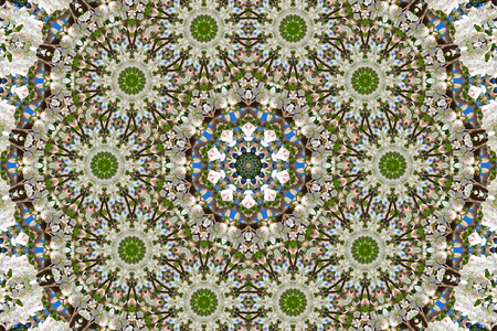 abstract background of floral pattern of a kaleidoscope. white blue green background fractal mandala. abstract kaleidoscopic arabesque. geometrical ornament flower patternの写真素材