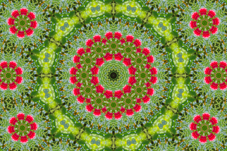 abstract background of floral pattern of a kaleidoscope. pink blue green background fractal mandala. abstract kaleidoscopic arabesque. geometrical ornament flower patternの写真素材