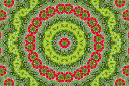 abstract background of floral pattern of a kaleidoscope. pink blue green background fractal mandala. abstract kaleidoscopic arabesque. geometrical ornament flower patternの写真素材