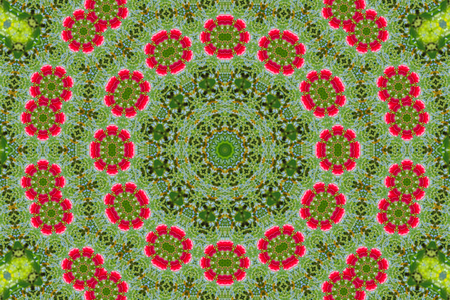 abstract background of floral pattern of a kaleidoscope. pink blue green background fractal mandala. abstract kaleidoscopic arabesque. geometrical ornament flower patternの写真素材