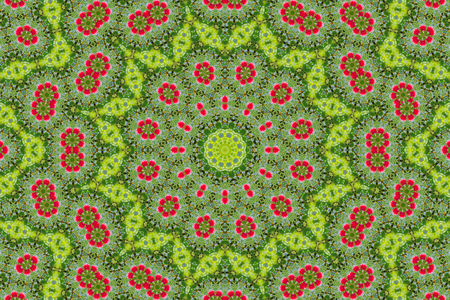 abstract background of floral pattern of a kaleidoscope. pink blue green background fractal mandala. abstract kaleidoscopic arabesque. geometrical ornament flower patternの写真素材