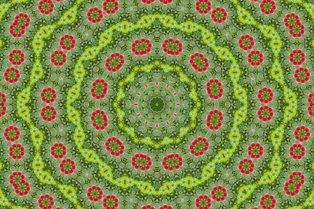 abstract background of floral pattern of a kaleidoscope. pink blue green background fractal mandala. abstract kaleidoscopic arabesque. geometrical ornament flower patternの写真素材