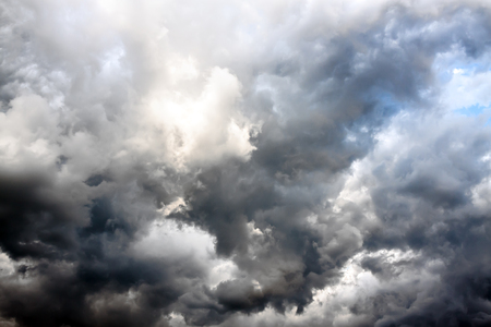 abstract background from moody sky and dark storm clouds. surface texture thunderstorm skyの写真素材
