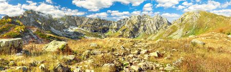 beautiful autumn mountain landscape panorama. panoramic view of mountain peaksの写真素材
