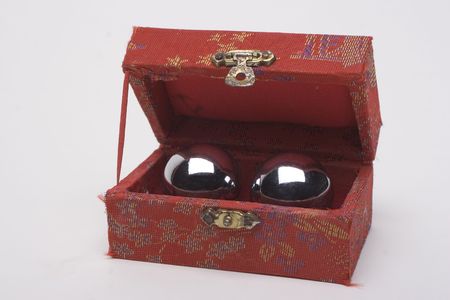 Mirror chinese healing ball in red boxの写真素材