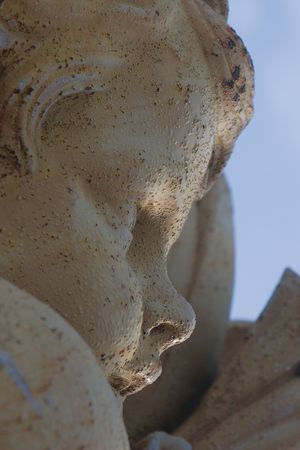 Close up of a cherubin statueの写真素材