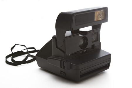 Instant polaroid camera dating from the late 80's open and ready to shootの写真素材