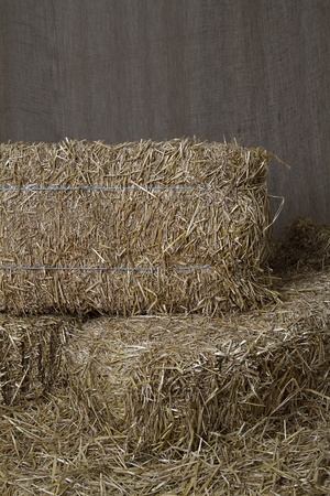 bales of straw in a barnの写真素材