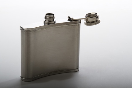 open flask against gray backgroundの写真素材