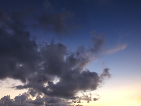 View of a sunrise on a cloudy dayの写真素材