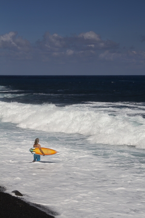Surfer looking into the break looking at the wavesの写真素材