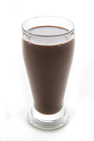 Tall glass of cold chocolate milkの写真素材