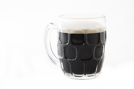 Beer buck filled with black beerの写真素材