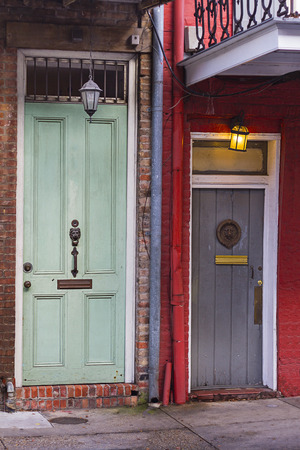 two old wood door from two different building from the french quarter in New Orleansの写真素材