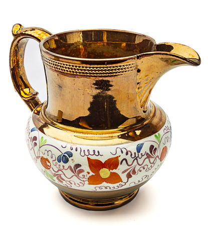 Small copper creamer with painted patternの写真素材
