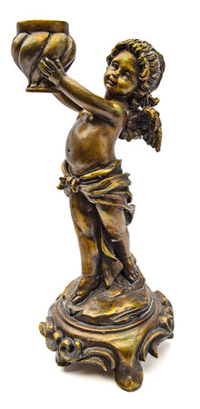 Isolated brass angel candle holder statue against a white backgroundの写真素材