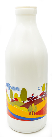 Milk bottle with country side designの写真素材