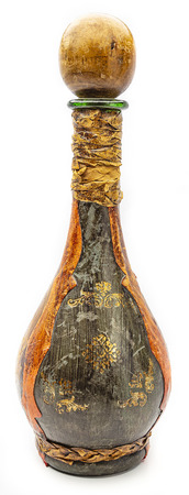 Painted bottle with round cork against white backgroundの写真素材