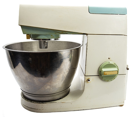 old 70s vintage tabletop kitchen mixer against white backgroundの写真素材