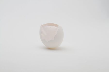egg with the top of the shell broken off with expose inner skin
