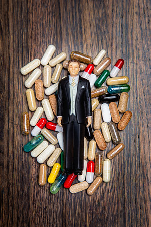 Groom cake topper on top of multiple natural supplementの写真素材