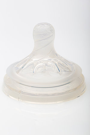 Clear silicon bottle nipple against a white backgroundの写真素材